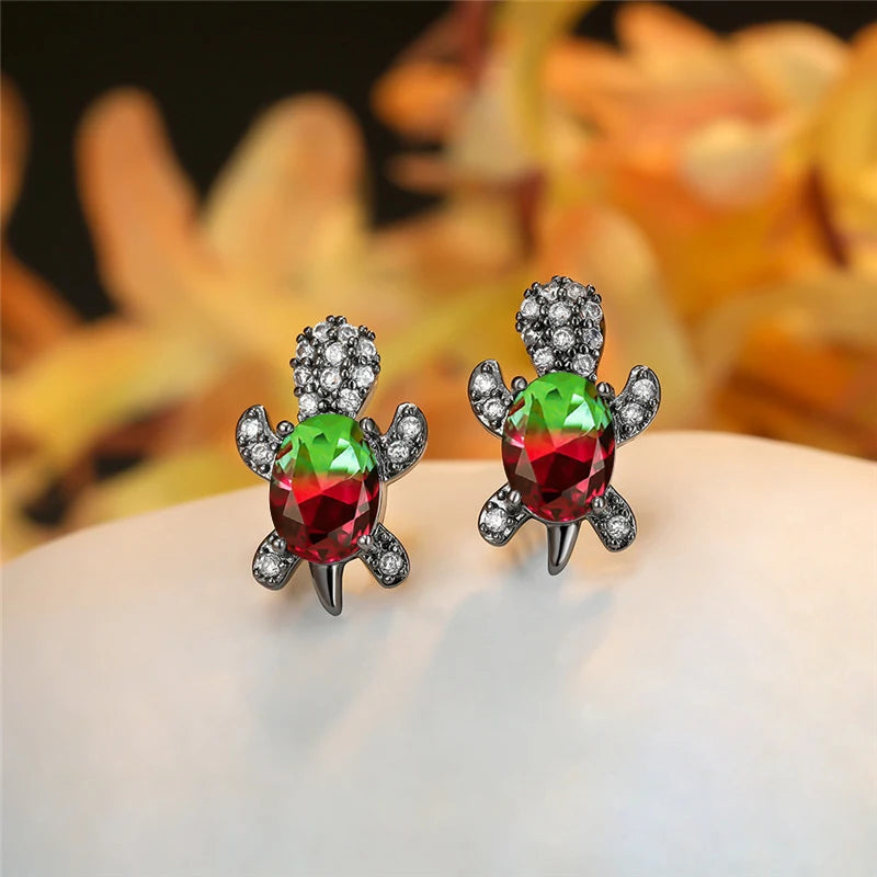 Crimson Forest Turtle Stud Earrings – Red & Green Zircon with Black Gold Finish
